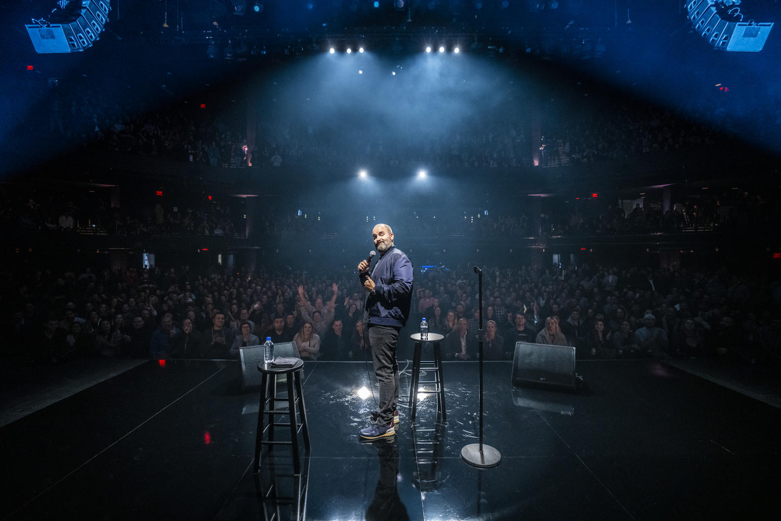 Tom Segura performing on tour